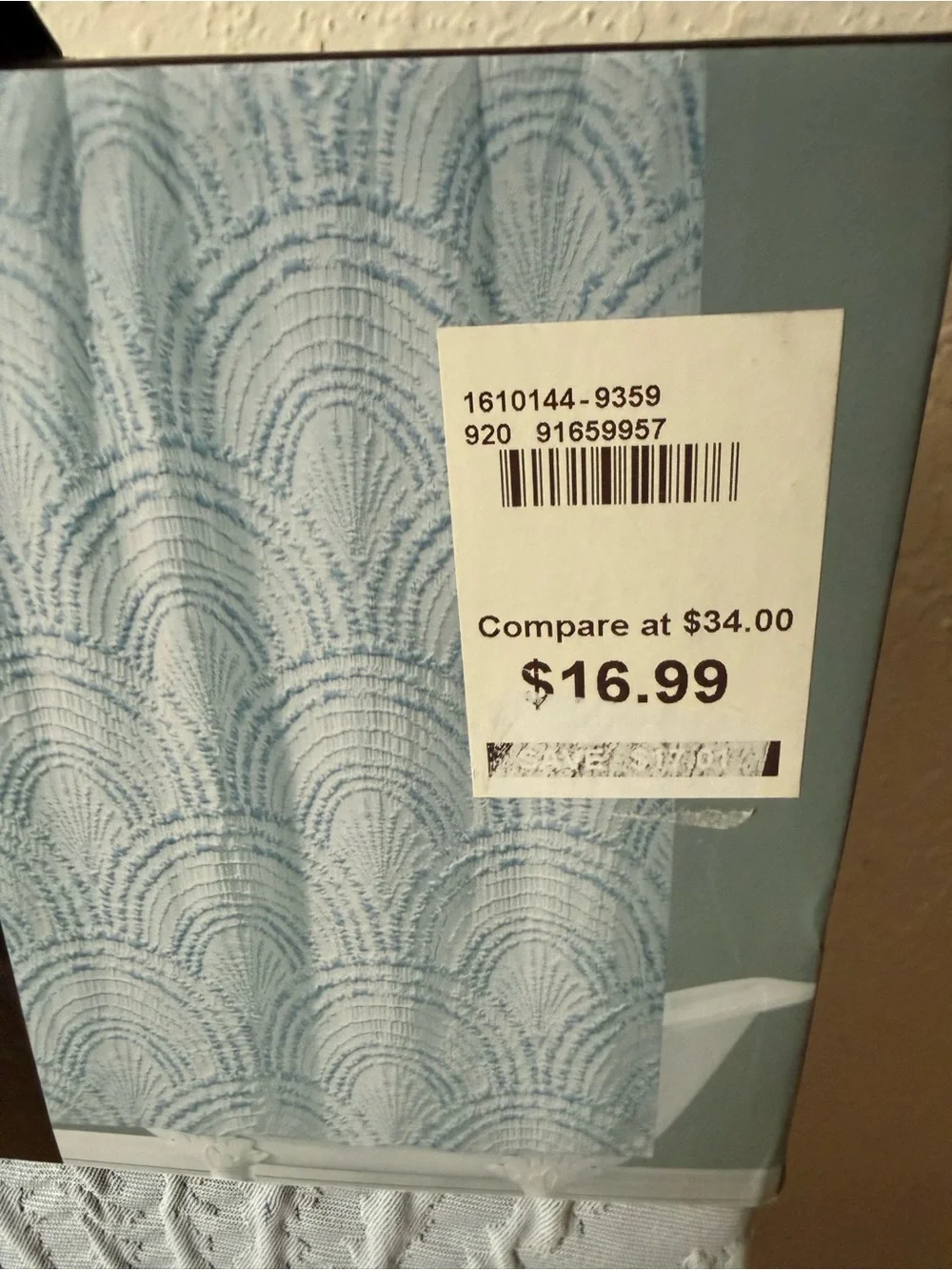 Avanti Modern Shells Shower Curtain in Light Blue.